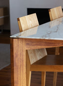 Custom furniture Palmares Table with a Green Guatemala Marble top, offering a unique and durable centerpiece for dining rooms.
