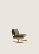 Juntowd Bernardo Lounge Chair: a wide and low bespoke furniture piece handcrafted in solid Oak with a relaxed angled back.