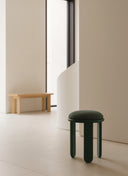 Upholstered Trio Stool in Green wood paint finish, a bold and sculptural bespoke accent seat for modern interiors.